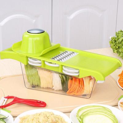 China Factory direct kitchen multifunctional vegetable cutting artefact set sustainable with grid box potato fruit peeler for sale