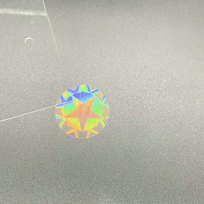 China Anti-Counterfeit Label Sticker Laser Hologram Overlay Rainbow Transparent Hologram Sticker for sale