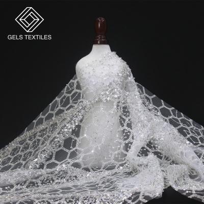 China New Breathable White Eyelet Fabric Indian Tulle Beaded Piece Powder Spraying Decorative Lace Fabric Wholesale For Wedding Dress for sale