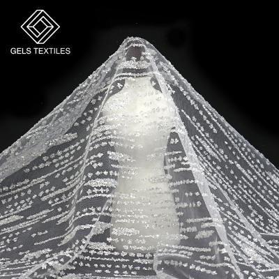 China 2022 New Breathable White Transparent Instant Tulle Lace Fabric 2021 Nigerian Beaded Sequin For Wedding for sale