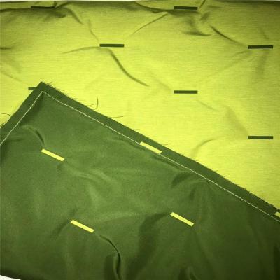 China New Design 50D*50D Down-fill Fabric Green Color 100%Polyester Reasonable Price Antistatic High Quality Down Jackets Fabric Te koop