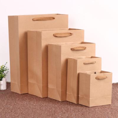 China Recyclable Wholesale Custom Printing Kraft Paper Shopping Packaging Bag for sale