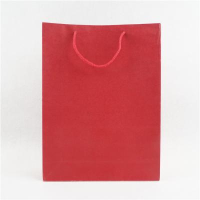 China Recyclable Customizable Full Color Red Shopping Kraft Paper Handle CMYK Printinh Foldable Recyclable Kraft Bag for sale