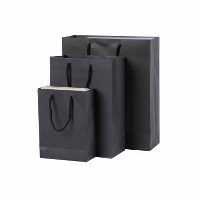 China Custom Eco - Friendly Materials Fashion Recycled Gift Kraft Paper Shopping Bag With Printed Logo for sale