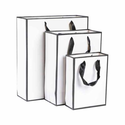 China Strong strength and explosion resistance China wholesale price logo paper bag custom design and color environmental protection paper bag for sale