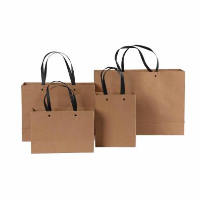 China Recycled Materials Paper Gift Bag Printing Craft Paper Bag Custom Brown Kraft Paper Bag for sale