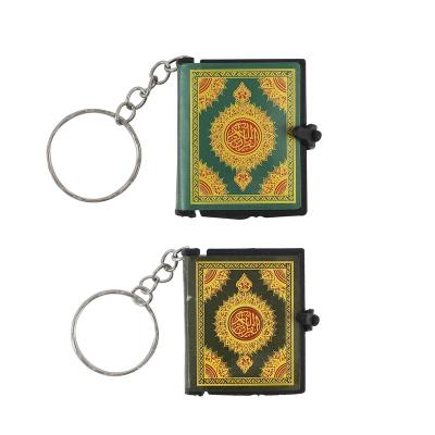 China Hot Skin Arabic Muslim Religious Pendant Small Mini Book Keychain Religious Handmade Quran Pendant for sale