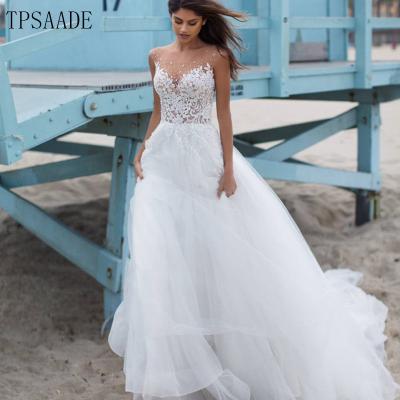 China Dry Cleaning Illusion Beach Custom Design Tulle Appliques Beaded Pearls Wedding Dress for sale