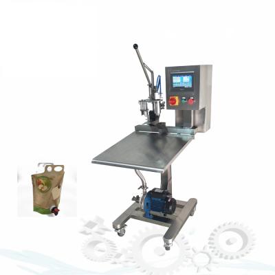 China Food KA PACKAGE 700ml Semi-automatic Medical Box-In-Bag Alcohol Filling Machine for sale