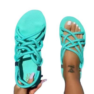 China Fashion trend 2021 summer hot sale women slip rope flat sandals wholesale ladies shoes breathable beach sandals fashion female sandals for sale