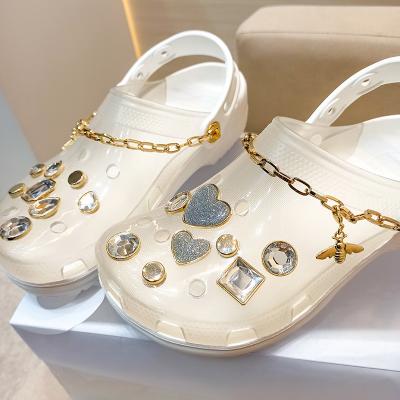 China Float 2021 Comfortable Cute Thick White Summer Wome Sandals PVC Jelly Detachable Beach Slippers Decoration Quick Dry Clip Light Holes for sale