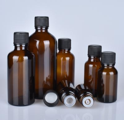 China Cosmetic Free Sample Essential Oil Glass Bottle For Cosmetic With Plastic Screw Cap for sale