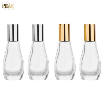 China Clear 12ml Cosmetic Empty Glass Roll On Bottle With Aluminum Cap For Perfume Essential Oil Cosmetic Packaging for sale