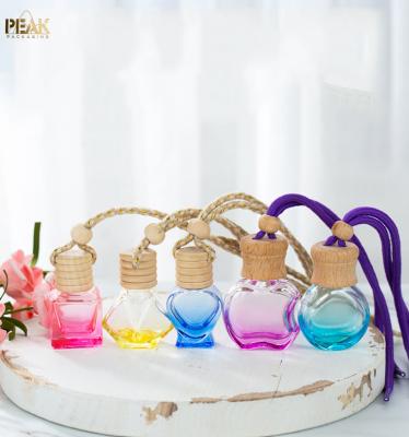 China 5ml 8ml 10ml Car Perfume Glass Bottle Essential Oil Aroma Diffuser Car Air Freshener Cosmetic Hanging Bottle for sale