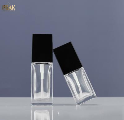 China 20ml 25ml 30ml Square Cosmetic Liquid Clear Empty Cosmetics Base Glass Bottle for sale