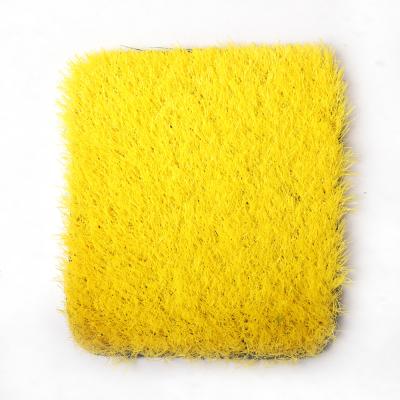 China Waterproof Yellow White Colored Artificial Grass Off Cuts Faux Grass Squares for sale