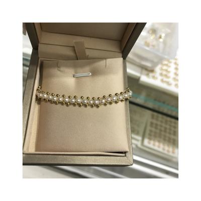 China Quarry 7-8mm AAA Office/Rice Shape White Freshwater Jewelry Green Elastic Diamonds Dangling Women Pearl Bracelets for sale