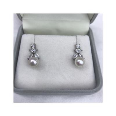 China Hot Fashion Cute 8mm Round Shape White Diamond Earrings New Model Chain Earrings Pearl for sale