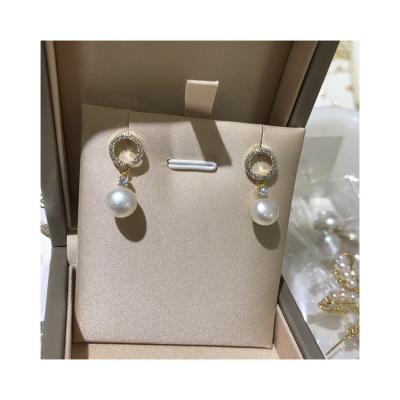 China Fashionable Vintage Simple Design Button Pearl White Diamond S925 7mm Natural Silver Pearl Stud Earrings for sale