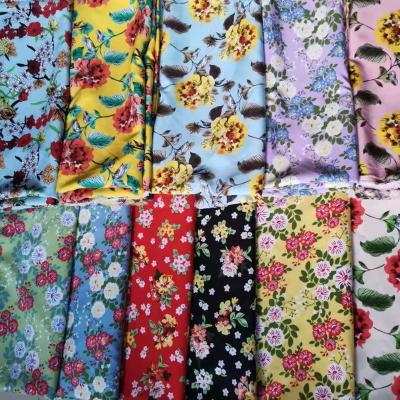 China Shaoxing waterproof workmanship reliable quality printed polyester satin silk cheap fabric for dress for sale