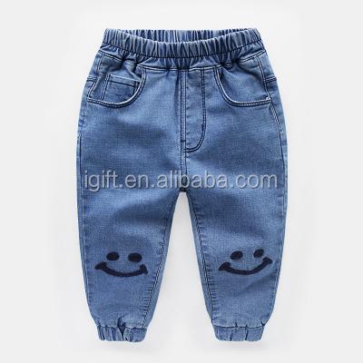 China Colored Fade Proof Design Your Own Small MOQ Logo Print Kids Slim Brushed Jeans For Boys Girls Spring Children's Jeans for sale