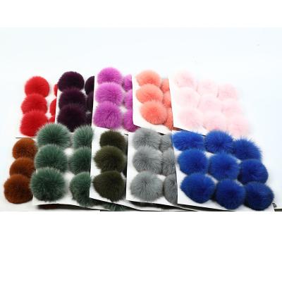 China 2022 soft hand feeling sell like hot cakes fox fur ball pom fluffy poms decoration diy fur pompoms for sale