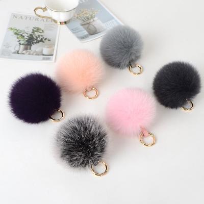 China Hademade cute10cm plush car plush toy car high-end fox fur pompom ball bag pendant ladies head chain pendant decoration for sale