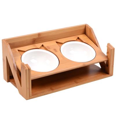 China Viable No Puddle Double Raised Slanted Cat Shape Bowls Dogs Feeder Holder Bamboo Wooden Feeding Racks for sale