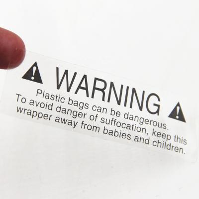 China Waterproof transparent warning stickers keep away from choking warning label for sale