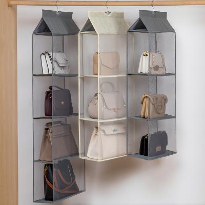 China Creativity Household Storage 4 Shelf Storage Hanging Bag for Handbag Mesh Bag Closet Organizer Dust Cover Hanging Bag Organizer for sale