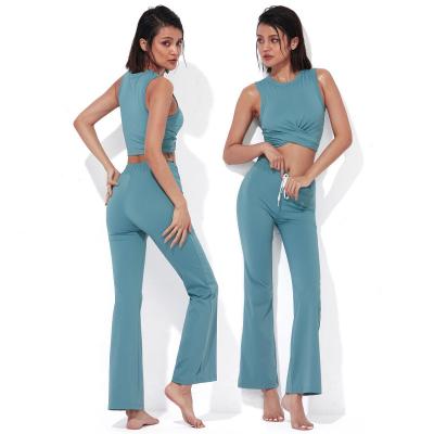 China Fashion Women Gym Breathable Fitness Sets Workout Exercise Two Piece Yoga Sets Women Gym Clothing Athletic Sports Vest And Flare Pants for sale