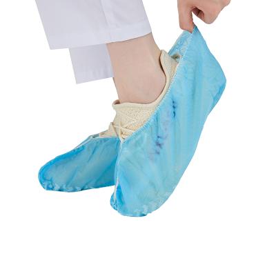 China Dispsoable handmade nonwoven shoe cover PP anti dust overshoes foot covers with anti slip strip for sale