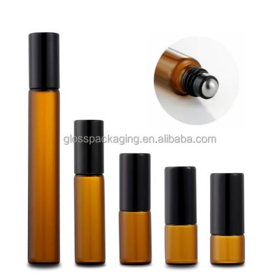 China Cosmetic luxury mini gold vintage 1ml 2ml 3ml 4ml 5ml 10ml 15 ml thick amber empty perfume oil roller ball white matte black glass bottle for sale