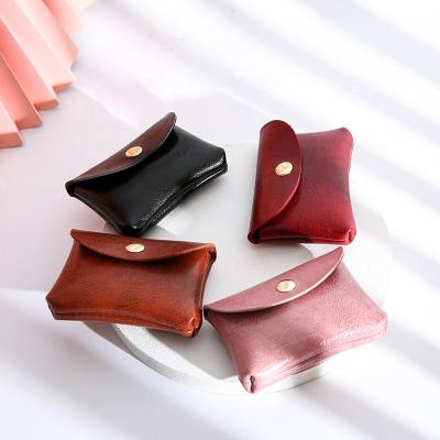 China 2021 new fashion mini small cute card bag portable multifunctional coin purse earphone storage bag for sale