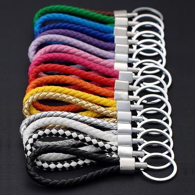 China Factory Handmade Car Logo Brand Key Chain Woven Leather Braided Roap To Leather Key Chain Accessories For Car Key for sale