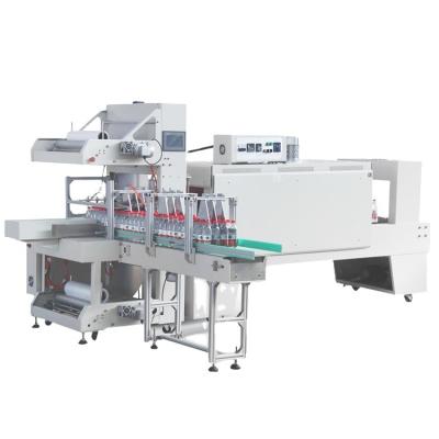 China Food Water Bottle Shrink Tunnel Wrapping Machine Shrink Wrap Wrapping Machine for sale