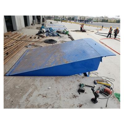 China 6T Type High Quality Heavy Building Material Stores Warehouse Fixed Hydraulic System Dock Ramp Yard Leveler Boarding Bridge for sale