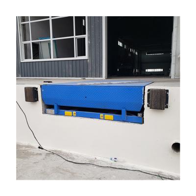 China Building Material Shops Hydraulic Dock Leveler Stationary Loading Ramp Bridge Fixed Boarding Loading Ramp 10 Ton for sale