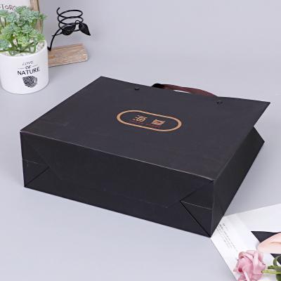 China Recycled Materials Hot Sale Hard Paper Bags Packaging Wedding Gifts Use Packaging Custom Gift Bags With Logo For Clothes for sale