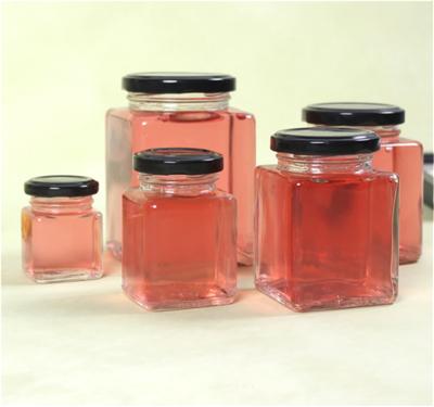 China CANDY in Stock Square Quadrilateral Shape Food Container Sealable Glass Jar with Tin Lid Honey Glass Bottle Recyclable Jar for sale