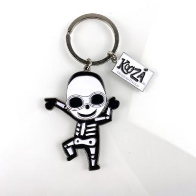 China Soft Enamel Zinc Alloy Keychain With Movable Skull Design For Circus-Inspired Promotion And Oversized Round Glasses for sale