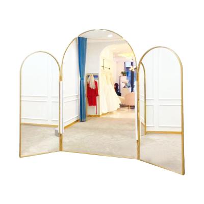 China Modern high quality arched full length 304 stainless steel mirror frame floor mirror for clothing store for sale