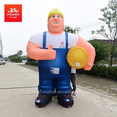 China High Quality Oxford Cloth Outdoor Event Promotional Giant Huge Huge Strongman Holding A Customized Inflatable Soccer Advertising Inflatable Tall Man for sale