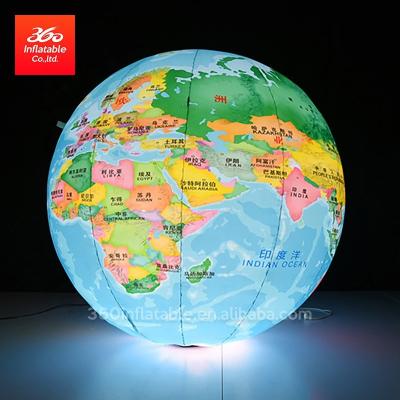 China Custom Made Oxford Cloth Advertising LED Inflatable Planet Ground Lighting Beautiful Blue Earth Inflatable Balloon Moon Ball For Decoration for sale