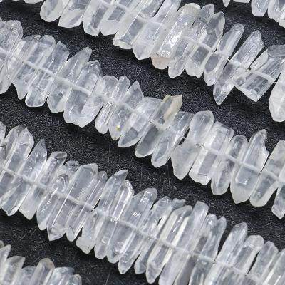 China No Wholesale Natural White Crystal Polished Crystal Column With Holes Raw Ore Polished Crystal Long Teeth Loose Beads for sale