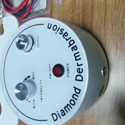 China Skin cleaning diamond dermabrasion machine with jet spray acne spot removal sand suction pump for sale