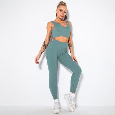 China Dropshipping Solid Color Women Workout Clothing Sportswear Breathable Gym Fitness Set Yoga Two Piece Sets With Crop Top And Gaiters for sale