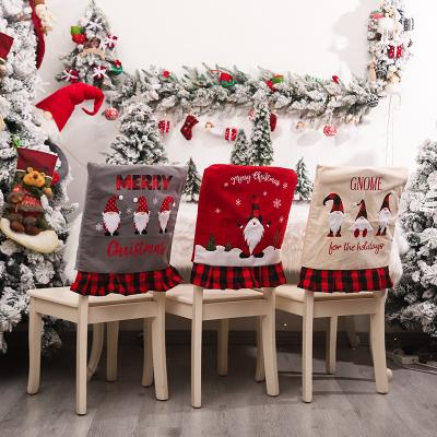 China Christmas Ornament Opens Cotton Santa Christmas Chair Cover Faceless Christmas Decoration Plaid Chair Cover Canvas Back for sale