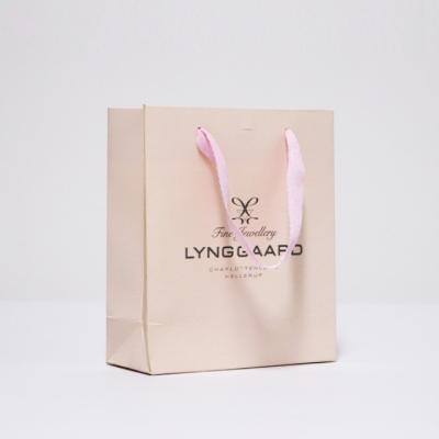 China Recyclable Wholesale Recyclable Kraft Paper Bag Shopping Paper Bags With Custom Logo for sale