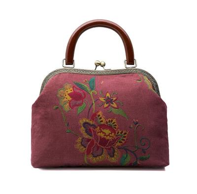 China Embroidery Daisy Purses & handbag,Cosmetic bag,Clutch bag,Metal frame purse for sale